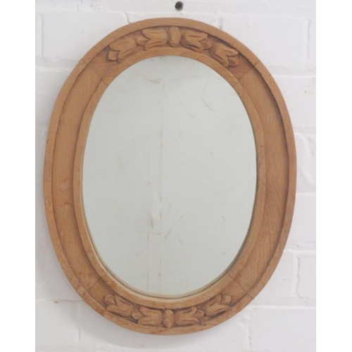 179 - Oval Pine Framed Wall Mirror carved with tulips approx. 42cm x 33cm (FRONT WALL)