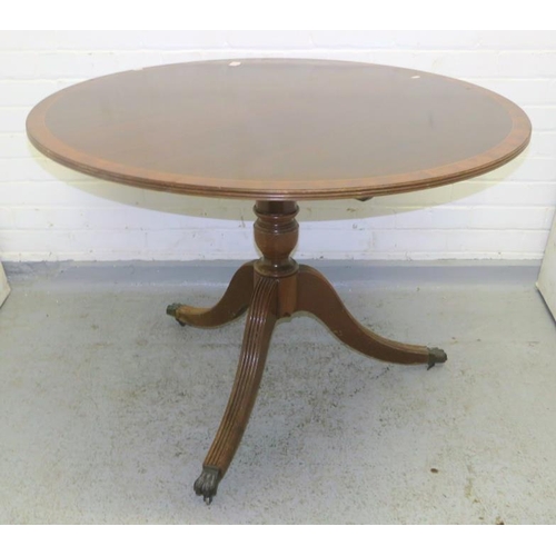 30 - Reproduction Regency Style Circular Table on pedestal castored paw supports approx. 106cm dia. x 75c... 