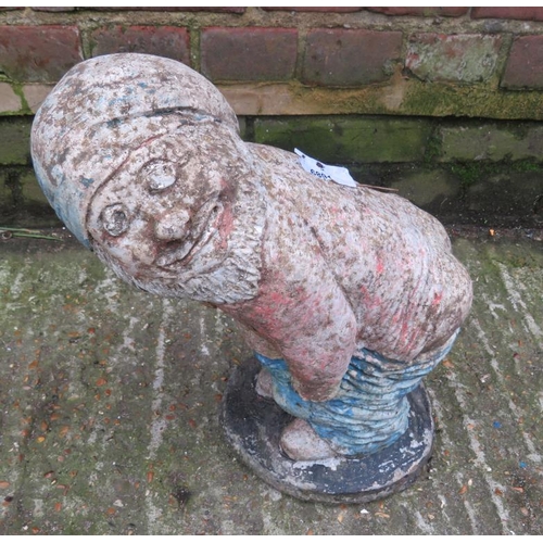 cast-concrete-gnome-pulling-trousers-down