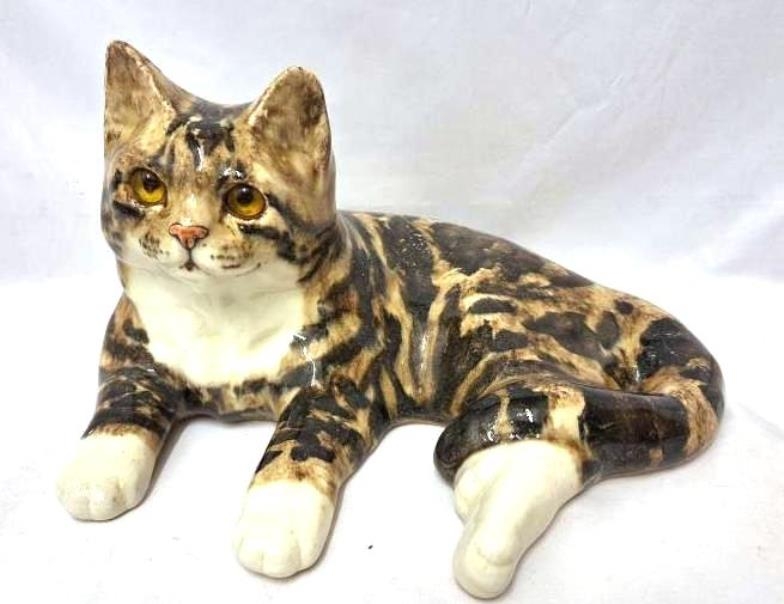 Winstanley Tabby Cat signed to base approx. 34cm L x 20cm H with glass eyes