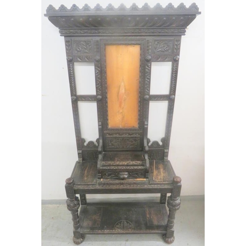 59 - Edwards & Roberts Victorian Gothic Heavily Carved Hall Stand with central mirror, glove box & under ... 