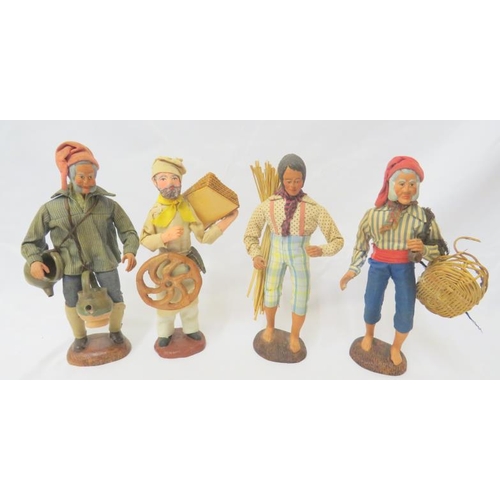 975 - French Provincial Terracotta Figures holding basket, kettle etc. approx. 29cm H (4)
