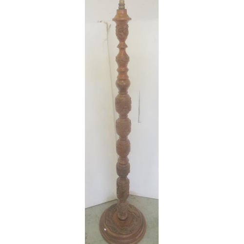 30 - Teak Oriental Carved Standard Lamp with decoration of dragons with cream shade approx. H160cm x base... 