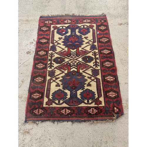 Red Aztec Style Rug in blue & cream approx. 91cm W x 130cm L (A4)