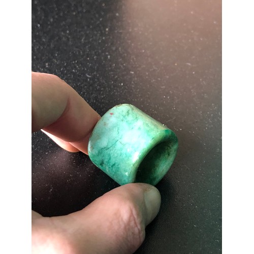 2 Chinese Hardstone Archers Rings, 1 jadeite & the other 'chicken blood ...