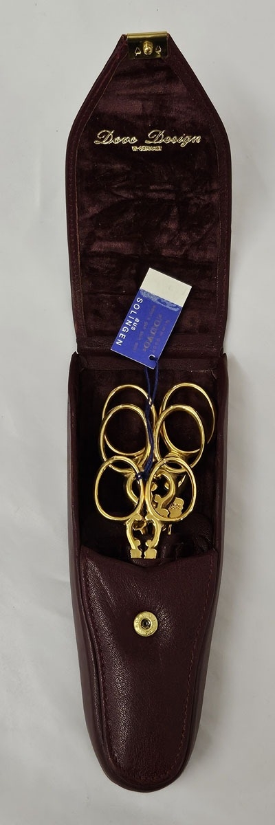 Boxed Set Gilt Handled Solingen Scissors in leather case, as new