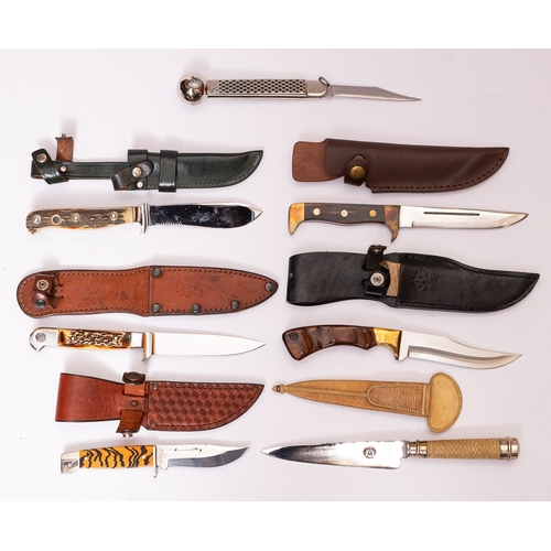 104 - A group of various hunting knives: including a Puma angler's knife with priest pommel, a Browning Bo... 