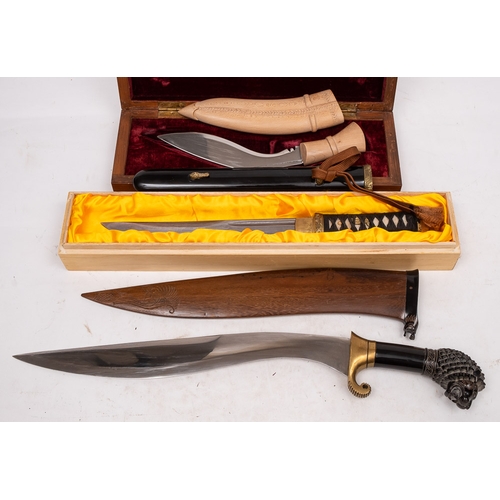 105 - An Indian presentation kukri in case: the plaque inscribed 'With Best Compliments K A Nambiar, Secre... 