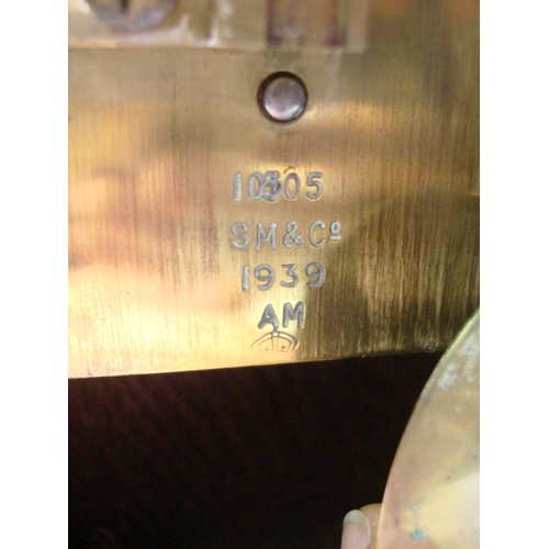 127 - A WWII RAF ward room mantel clock: the single fusee movement with Arabic numeral dial marked with RA... 