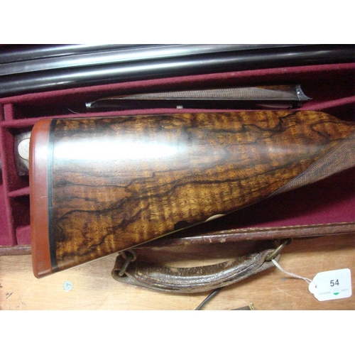 54 - A Boss and Co double barrel twelve bore easy opening ejector: No 22894, plain 28 inch barrel over sc... 