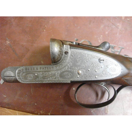 54 - A Boss and Co double barrel twelve bore easy opening ejector: No 22894, plain 28 inch barrel over sc... 