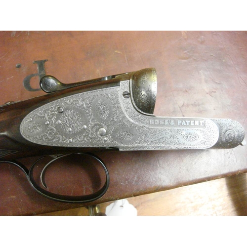 54 - A Boss and Co double barrel twelve bore easy opening ejector: No 22894, plain 28 inch barrel over sc... 