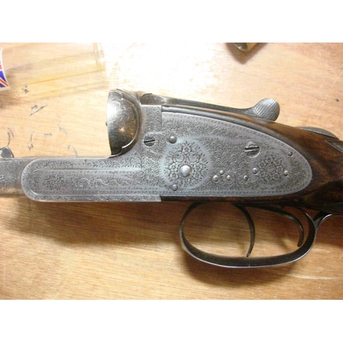 55 - A Joseph Lang double barrel 12b sidelock ejector:  28 inch barrels No.8604, scroll engraved fences a... 