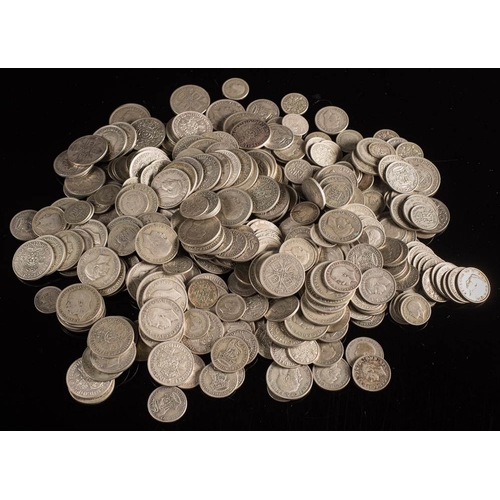 570 - A collection of pre-1947 silver coins: approx 2.7kg.