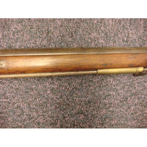 58 - A 19th century-style percussion cap musket: the 36 inch barrel with steel ramrod beneath, plain back... 