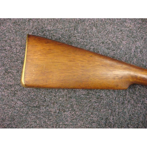 58 - A 19th century-style percussion cap musket: the 36 inch barrel with steel ramrod beneath, plain back... 