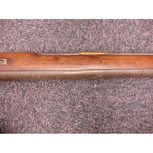 58 - A 19th century-style percussion cap musket: the 36 inch barrel with steel ramrod beneath, plain back... 