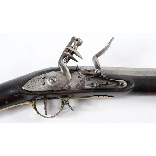 61 - A 19th century Anglo-Indian flintlock blunderbuss:  the 16 3/4 inch two stage steel barrel with engr... 