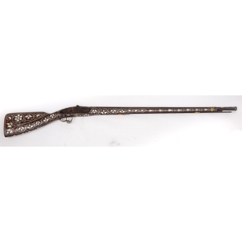 63 - A 19th century Turkish white metal and mother of pearl inlaid percussion cap rifle: the 35 inch  bar... 