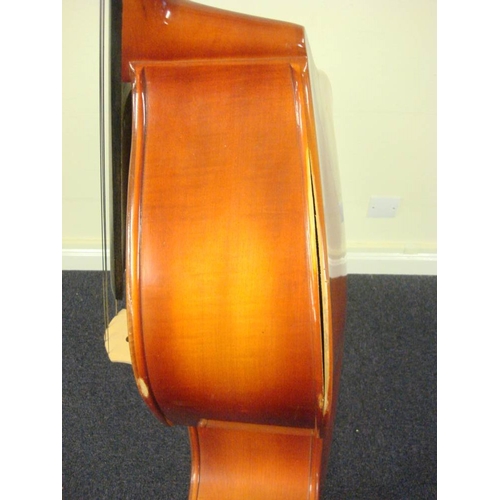 873 - A three quarter size double bass:, unsigned, with scroll carved headstock and brass keys, over body ... 