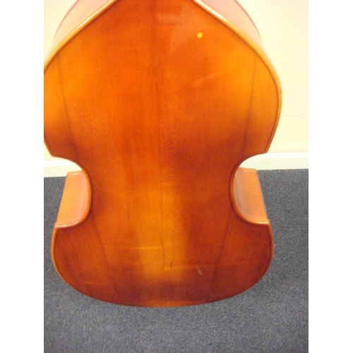 873 - A three quarter size double bass:, unsigned, with scroll carved headstock and brass keys, over body ... 