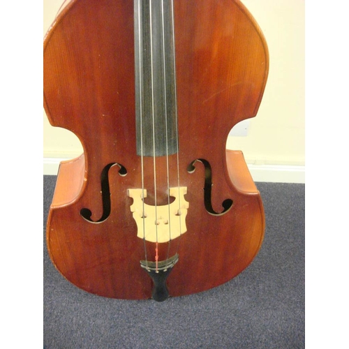 873 - A three quarter size double bass:, unsigned, with scroll carved headstock and brass keys, over body ... 