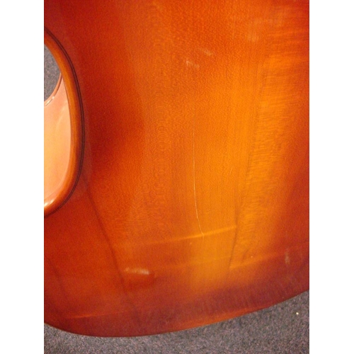 873 - A three quarter size double bass:, unsigned, with scroll carved headstock and brass keys, over body ... 