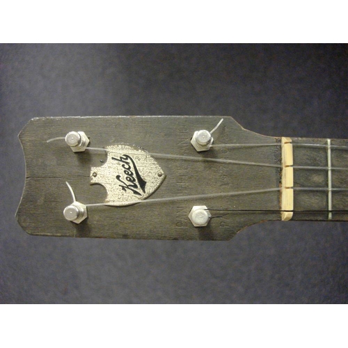 876 - An eight string 'Dulcetta' ukulele banjo by John Grey & Sons, London in case: together with a Keetch... 