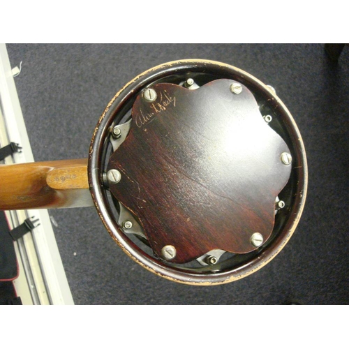 876 - An eight string 'Dulcetta' ukulele banjo by John Grey & Sons, London in case: together with a Keetch... 