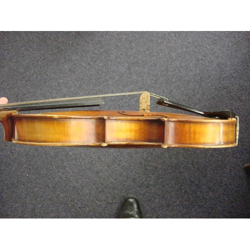 878 - A Czechoslovakian viola: scroll carved headstock over ebony finger board and body with two piece bac... 