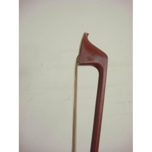 883 - A 20th century German cello:, scroll carved headstock with ebony keys and fingerboard, two piece fla... 