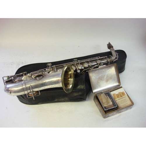 884 - A French silver plated 'Meha' Alto saxophone: numbered 4015, together with a collection of various r... 