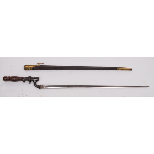 91 - An 1876 pattern Martini Henry bayonet fitted later wooden handle: (used for home defence) in gilt br... 