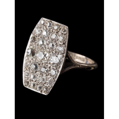 1113 - An Art Deco platinum and diamond rectangular cluster ring: mille-grain-set with round old brilliant-... 