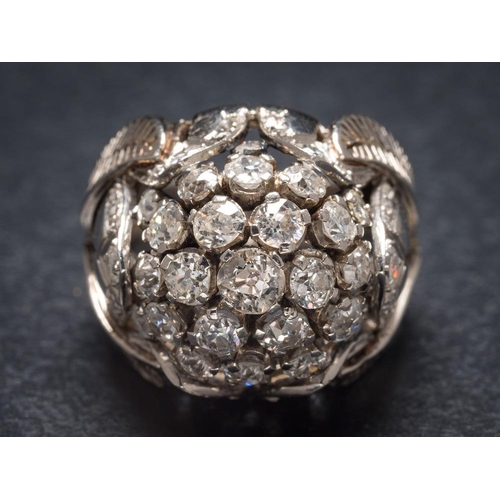1115 - A diamond bombe cluster ring: with central cluster of round old brilliant-cut diamonds estimated to ... 