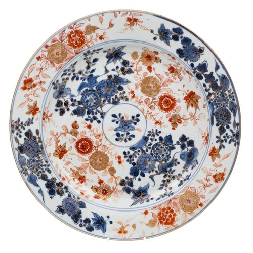 1146 - Two Chinese Imari chargers: both decorated in underglaze blue, iron-red and gilt with flowers and fo... 