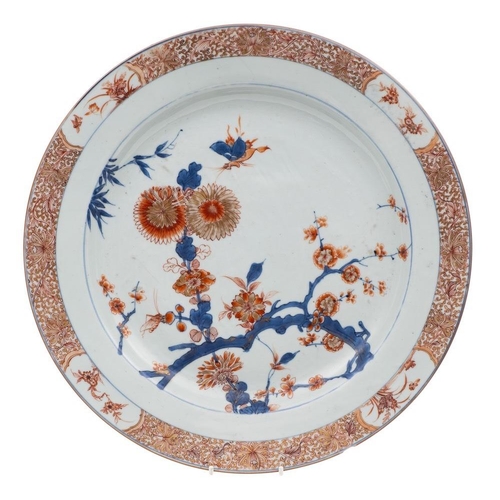 1146 - Two Chinese Imari chargers: both decorated in underglaze blue, iron-red and gilt with flowers and fo... 