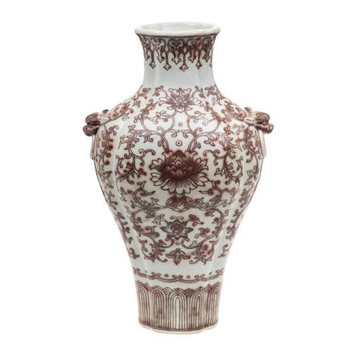 1157 - A Chinese underglaze copper-red decorated quadrilobed vase: with grotesque mask ring handles, painte... 
