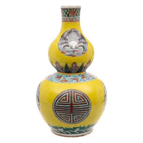 1160 - A Chinese famille jeune double gourd vase: painted with Shou and bird medallions between wave, lappe... 