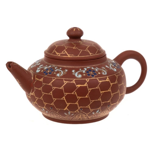 1164 - A small Chinese Yixing stoneware teapot: of light brown hue with squat body, simple handle and spout... 