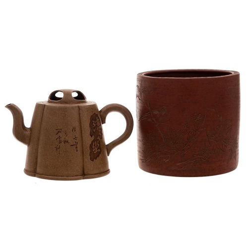 1165 - A Chinese Yixing teapot and bitong: the former of buff colour and of tapering lobed form with pierce... 
