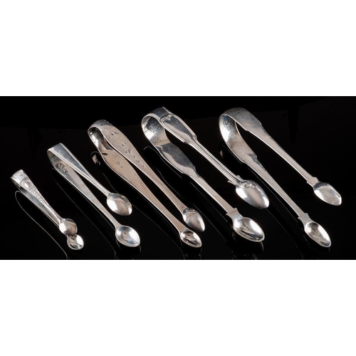 804 - A pair of Georgian Irish silver sugar tongs, maker Samuel Neville, Dublin, no date letter: 15cm long... 
