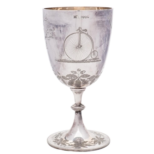 808 - OF CYCLING INTEREST A Victorian silver trophy cup, maker William Hutton & Sons , London, 1883: inscr... 