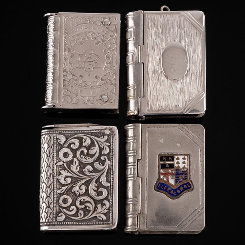 819 - An early 20th century silver plated vesta case/stamp holder in the form of a book: bears enamelled c... 