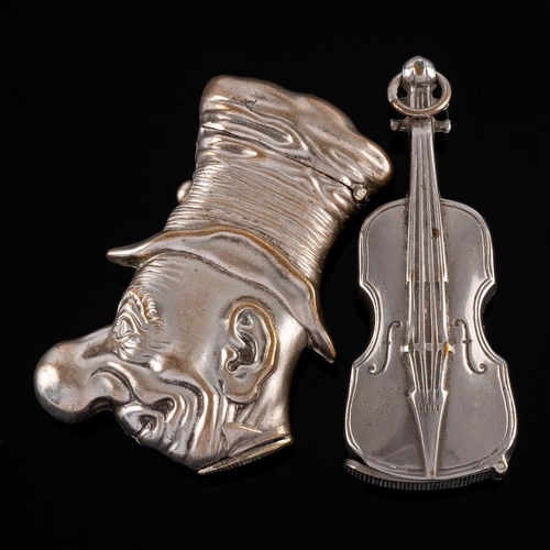 830 - A novelty plated vesta case: modelled as Mr Ally Sloper, 6cm high, together with another vesta case ... 