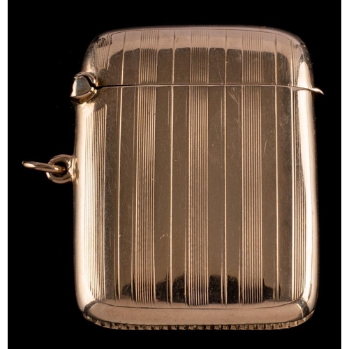 848 - A George V 9ct gold vesta case, maker C & C??, Birmingham, 1919: of traditional rectangular outline,... 