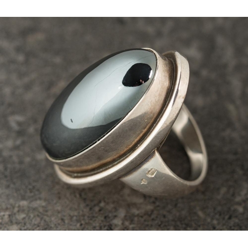 185 - Georg Jensen. A silver and oval hematite single-stone ring design number 46E: designed by Harald Nie... 