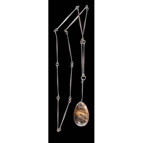 191 - Georg Jensen. A silver and rutilated quartz single-stone pendant design number 131: designed by Vivi... 