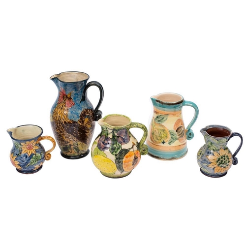 283 - *Paul Jackson (Contemporary) five terracotta jugs: of various forms each with a strap handle and scr... 