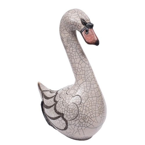 290 - *Jennie Hale (Contemporary) a hand built raku fired swan: of generous proportions under crazed white... 